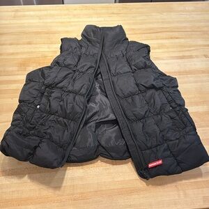 iets frans urban outfitters black puffer vest
